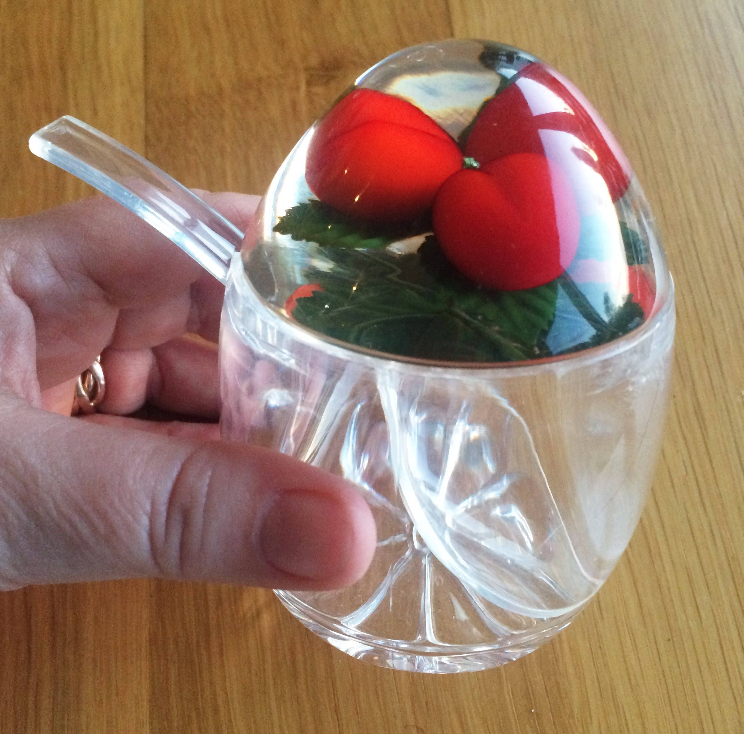 Medium size vintage lucite plastic jam pot with plum fruit in