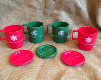 4 Christmas tupperware mugs, and 3 coasters