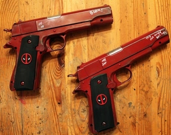 Deadpool twin 45. Cal Pistol with custom grips. Also available for Lady Deadpool.