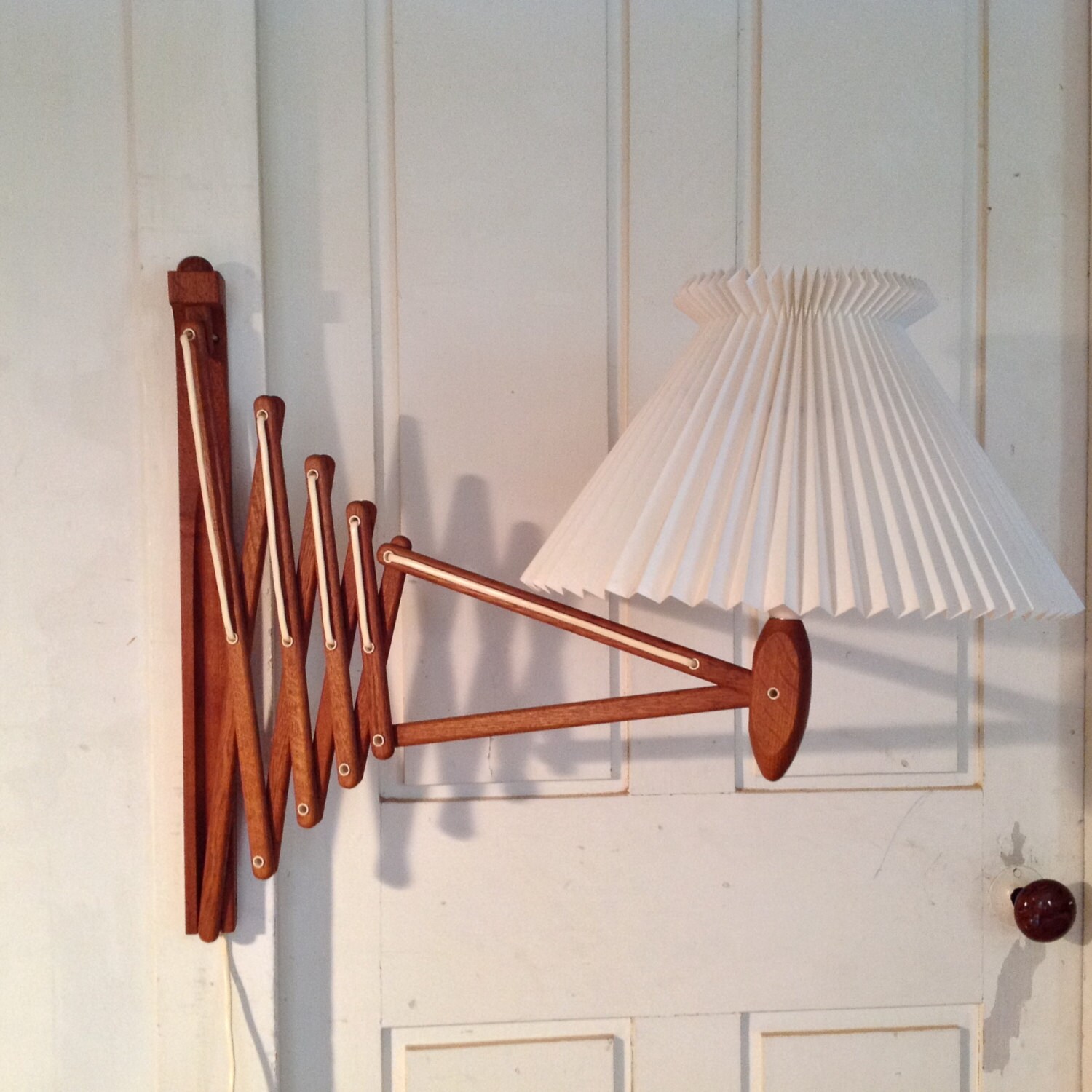Le Klint teak scissors lamp with handmade pleated shade