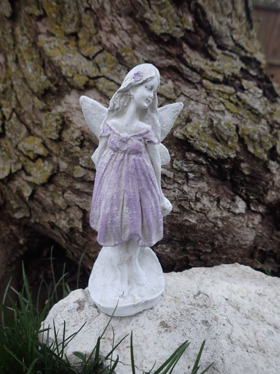 concrete fairy statues