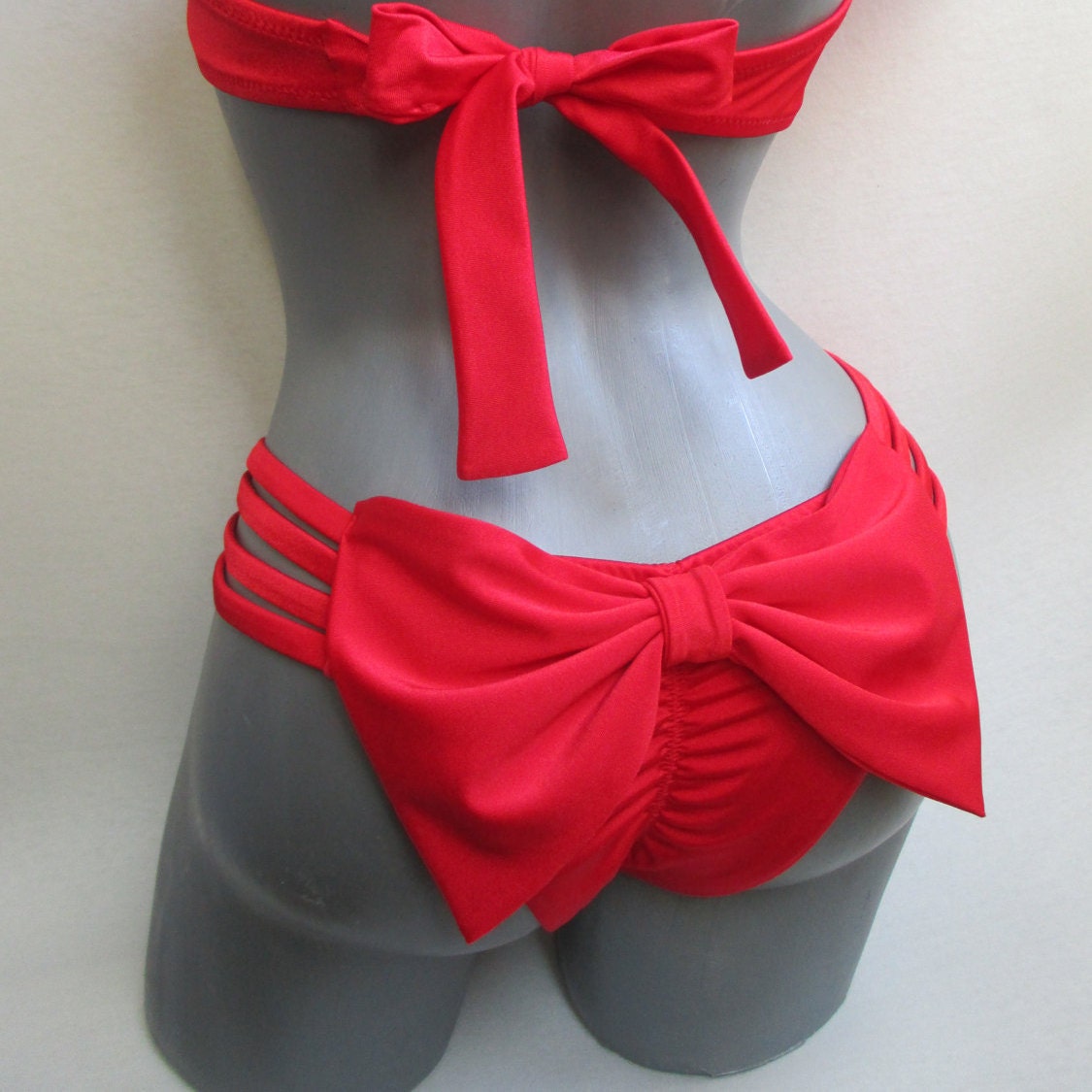 cheeky bikini bottom side straps oversized bow brazilian