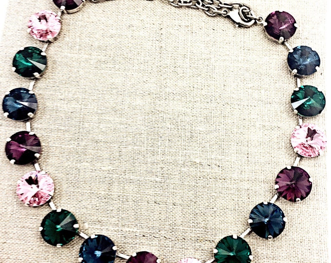 Rainbow of colorful Swarovski rivoli crystals set in a collar statement necklace. Anna Wintour style layering necklace, more is more.
