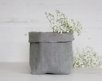 Grey storage basket handmade from eco-friendly natural linen fabric