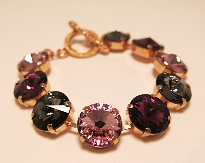 Glamorous fashion forward bold purple amethyst multi colored 14mm rivoli Swarovski crystal tennis bracelet jewelry in rose gold.