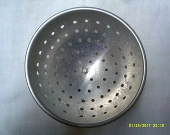 Vintage child's doll house metal colander