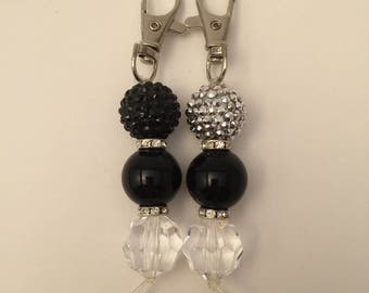 Small chunky gumball keyring or key chain, available in black, red or pink.