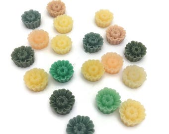 10 mixed color resin aster cabochons in cupcake style . Size is 7 mm x 16 mm