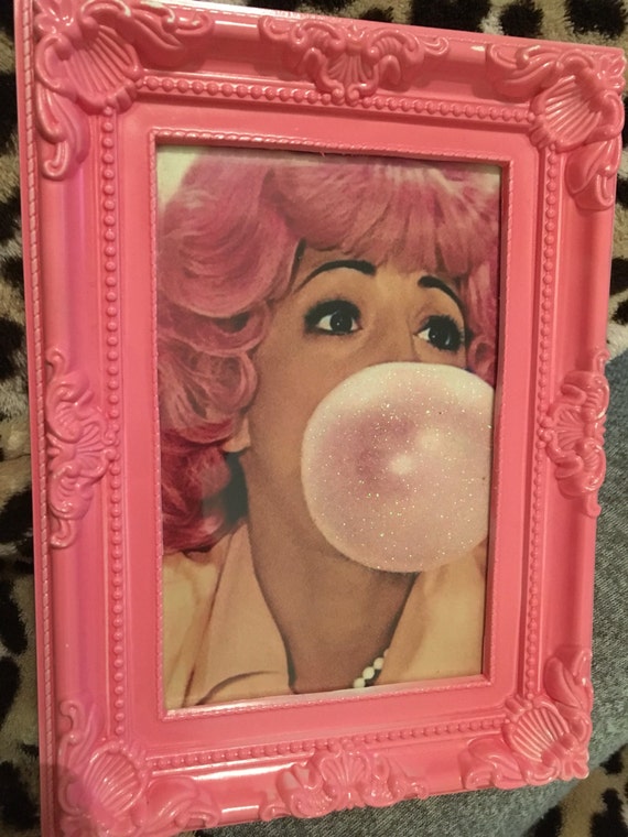 Frenchie from Grease glitter bubble gum print in a pink frame