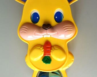Vintage pull string musical toy rabbit rare collectibles crib yellow music box seventies peek-a-boo baby soother retro collectable