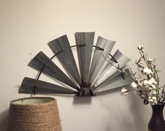 Metal windmill wall decor