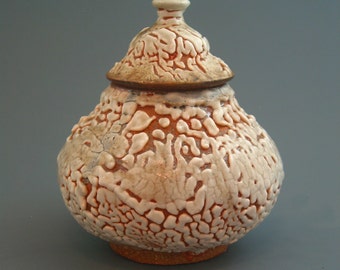 Covered Jar, wood-fired stoneware w/ crawling shino and natural ash glazes