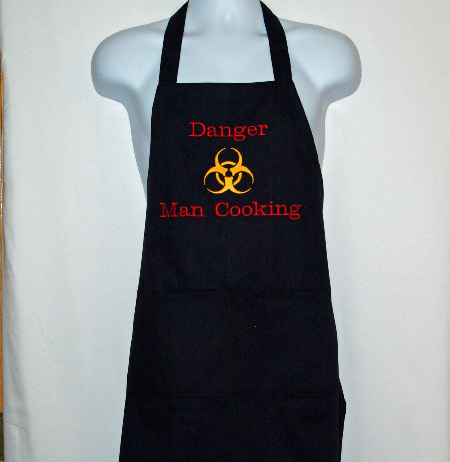 Man's Apron Danger Man Cooking With Hazard Symbol