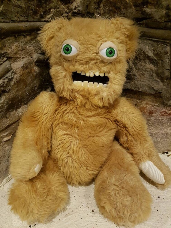 teddy bear with human teeth