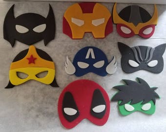 12 Superhero edible fondant toppers.