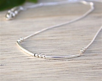 Necklace bangles and solid silver beads on string