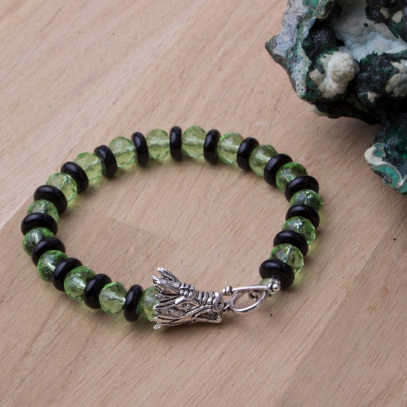 Items similar to Dragon bracelet Green and Black beaded dragon head