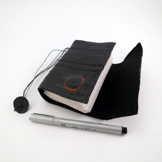 Recycled journal, bike inner tube, blank pages, black linen and black velcro closure, small.