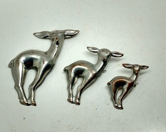 M11: Unique Silver Tone Stamped Metal Vintage Reindeer Family Brooch Set-three brooches