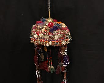 Uzbek ethnic tribal kuchi hat decorating home