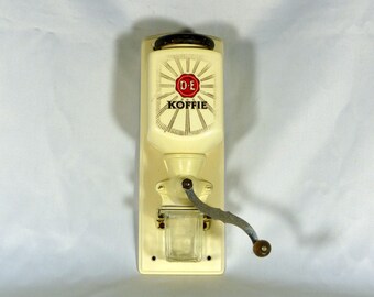 Decorative coffee grinder.