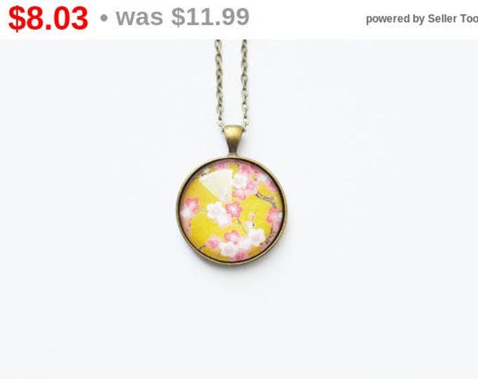 FLORAL MOTIFS Round pendant with flower from brass and glass retro and vintage