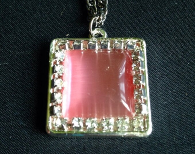 Storewide 25% Off SALE Vintage Rose Colored Opalescent Polished Rhinestone Pendant With Silver Tone Necklace Featuring Clear Rhinestone Acce