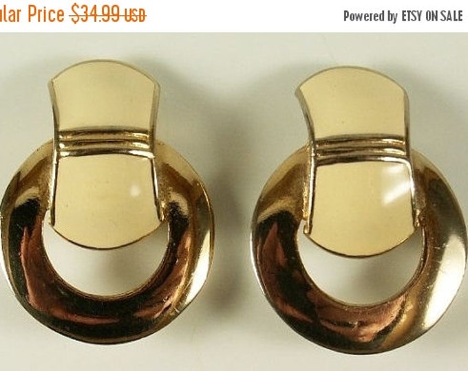 Storewide 25% Off SALE Beautiful Vintage mid century style circular stylish clip earrings designed of gold tone with cream colored enamel ov