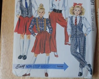 McCall's Girls Vest Blouse Skirt and Pants Uncut #4491 Size Taille 7,8,10 Manufacture folds