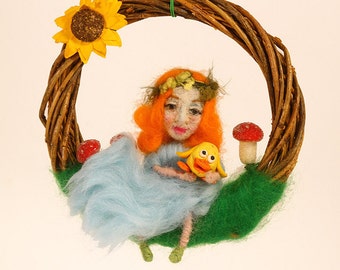 Helena, the needle felted doll on a wicked wreath, realistic face, dedicated to people who suffering from dementia.