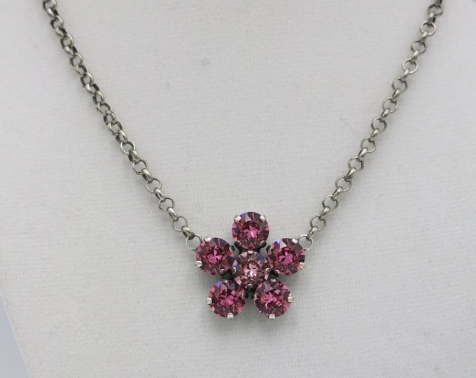 Pink flower genuine Swarovski crystal pendant necklace on a rolo chain with a lobster clasp.