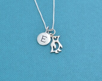 Little girl's penguin necklace in sterling silver on a 14" sterling silver box chain and personalized with a sterling silver Letter G charm.