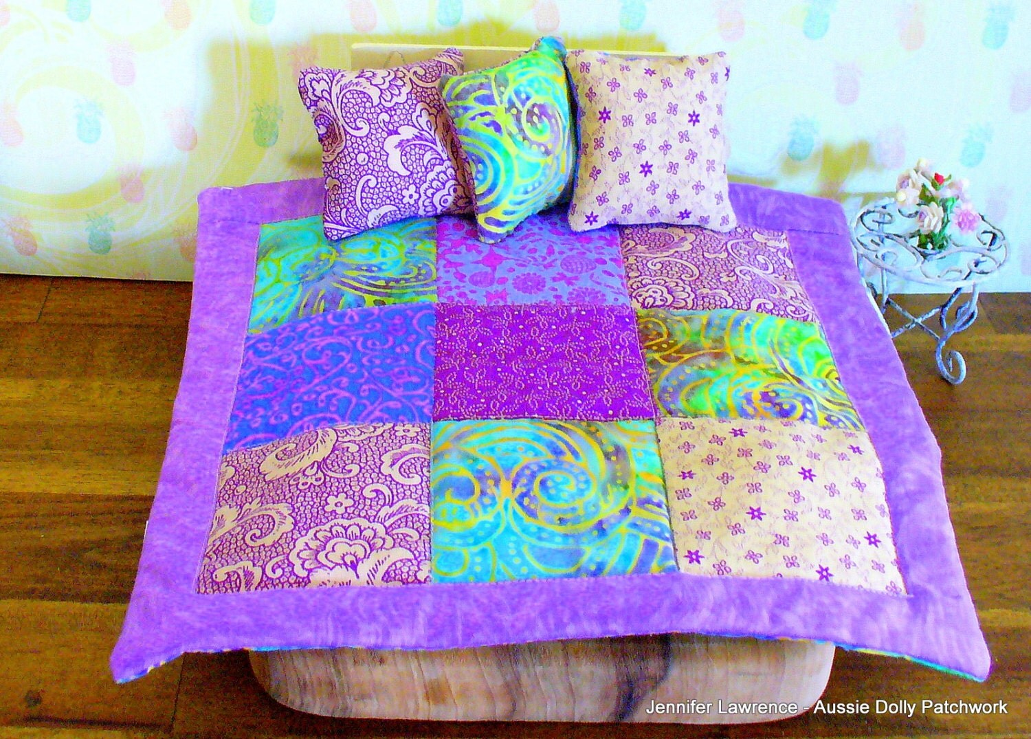 1/6th scale Barbie doll size quilt in Aquamarine hued Batik