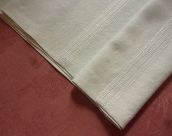 A former white fine linen, office, harvest, old linen tablecloth
