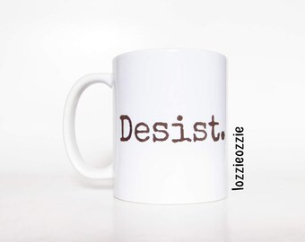 Grumpy unusual gift.Desist vintage typewriter type text mug.Great gift for miserable antisocial, difficult to buy for people amongst us.