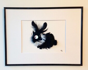 Painting donkey rabbit sculpture in feathers