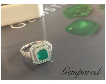 Natural Emerald 0.86 ct. setting on 18K WG Ring and diamonds