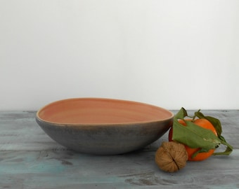 Curved bowl in ceramic in different colours