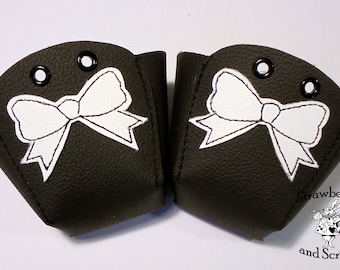 Black leather Roller Derby skate toe guards with Bows
