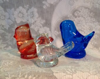 Collection of 3 blown art glass bird figurines signed by artist Ron Ray clear red and blue handcrafted collectible home decor