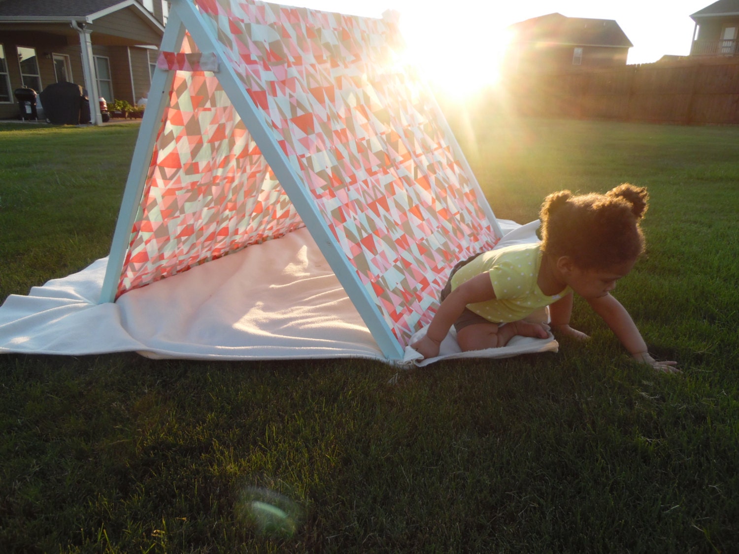Fold Flat Tent with Painted Sticks and Printed Fabric
