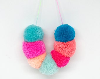 Pom pom necklace on pastel ombre cord