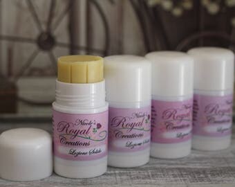 Solid lotion, moisturizer, solid perfume, solid lotion bar, solid lotion stick, lotion bar in roll up tube, solid lotion in roll up tube