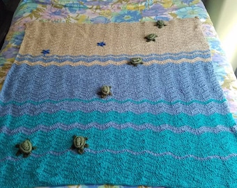 Crochet sea turtle blanket.36" by 42" or you have the option to order a couch throw with hand stitched sea turtles and two star fish.