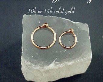 Tiny 14k Gold nose ring. 14k real gold earrings. One ring or one pair. Second hole ring. Solid gold ball earrings. Tiny Gold Nose ring hoop