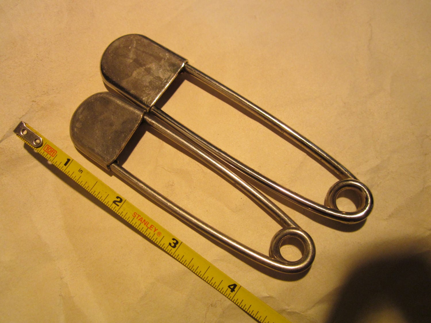 2 Industrialduty safety pins, one 4", the other is 5" from