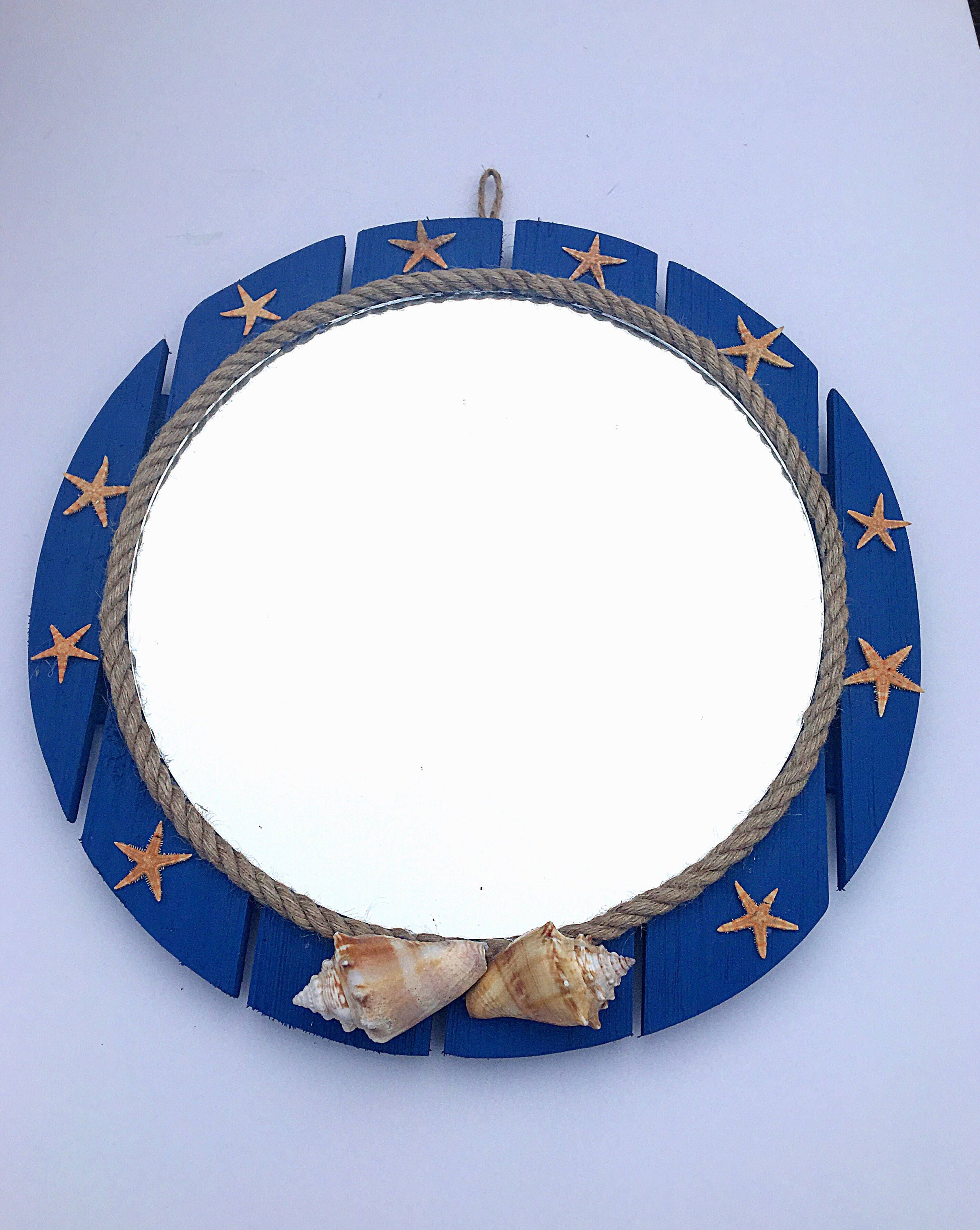 Round blue coastal beach themed mirror