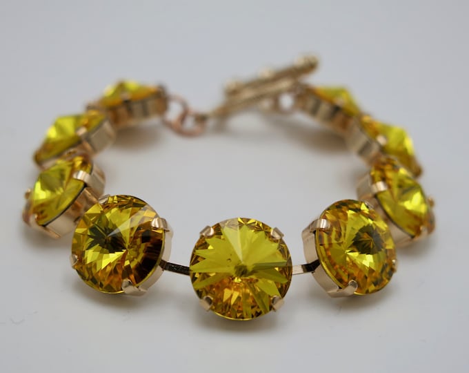 Timeless fashion forward Swarovski crystal 14mm sunflower rivoli tennis bracelet that embodies elegance .