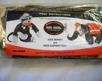 Sock monkey kit, vintage craft kit, kit to make a sock monkey sock elephant, red heel socks, stuffed animal