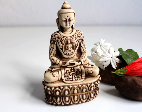 resin buddha meaning